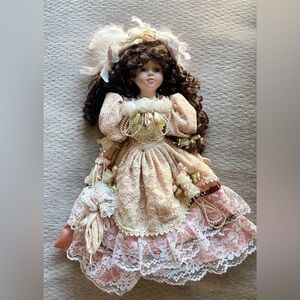 Charming Vintage Porcelain Doll with Pink Lace Dress
